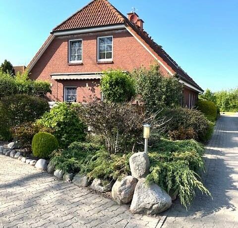 mit Gartenterrasse
